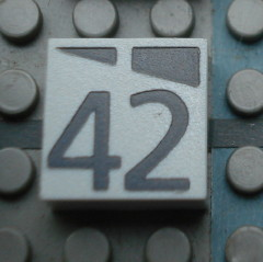 Modulex, Tile 2 x 2 (no Internal Supports) with Dark Gray Slopes and Calendar Week Number 42 Pattern
