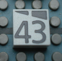 Modulex, Tile 2 x 2 (no Internal Supports) with Dark Gray Slopes and Calendar Week Number 43 Pattern
