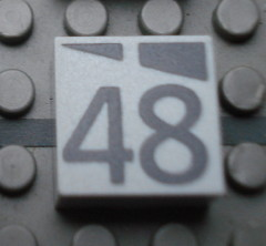 Modulex, Tile 2 x 2 (no Internal Supports) with Dark Gray Slopes and Calendar Week Number 48 Pattern
