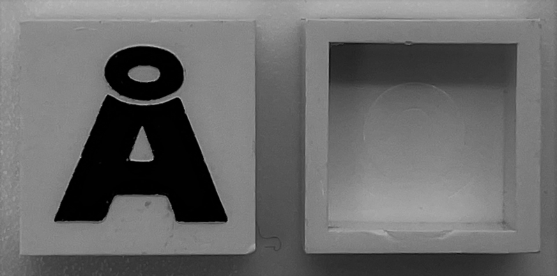 Modulex, Tile 2 x 2 (no Internal Supports) with Black Capital Letter A with Ring (Å) Pattern