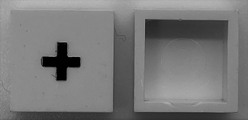 Modulex, Tile 2 x 2 (no Internal Supports) with Black Plus Sign (+) Pattern