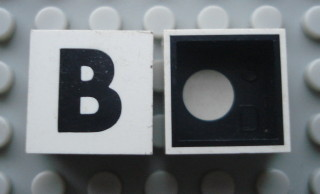 Modulex, Tile 2 x 2 with Black 'B' Pattern (Black internal lining with White dot)