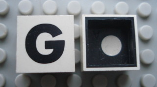 Modulex, Tile 2 x 2 with Black 'G' Pattern (Black internal lining with White dot)