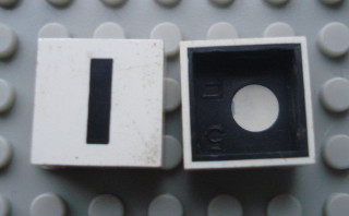 Modulex, Tile 2 x 2 with Black 'I' Pattern (Black internal lining with White dot)