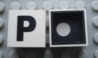 Modulex, Tile 2 x 2 with Black 'P' Pattern (Black internal lining with White dot)