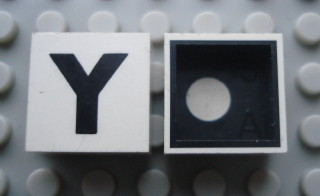 Modulex, Tile 2 x 2 with Black 'Y' Pattern (Black internal lining with White dot)