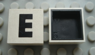 Modulex, Tile 2 x 2 with Black 'E' Pattern (Black internal lining no dot)