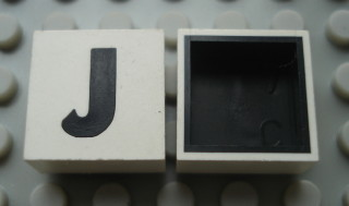 Modulex, Tile 2 x 2 with Black 'J' Pattern (Black internal lining no dot)