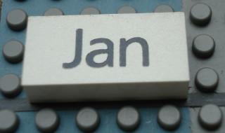 Modulex, Tile 2 x 4 with Dark Gray Month 'Jan' Pattern