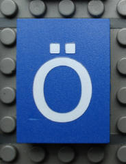 Modulex, Tile 3 x 4 (no Internal Supports) with White Lowercase Letter o with Diaeresis (ö) Pattern