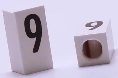 Tile, Modified 1 x 2 x 5/6 Stud Hole in End with Black Number 9 Pattern