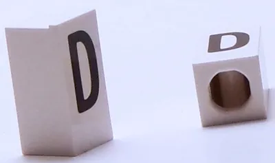 Tile, Modified 1 x 2 x 5/6 Stud Hole in End with Black Capital Letter D Pattern