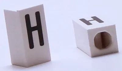 Tile, Modified 1 x 2 x 5/6 Stud Hole in End with Black Capital Letter H Pattern