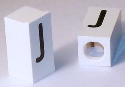Tile, Modified 1 x 2 x 5/6 Stud Hole in End with Black Capital Letter J Pattern