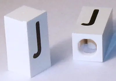 Tile, Modified 1 x 2 x 5/6 Stud Hole in End with Black Capital Letter J Pattern