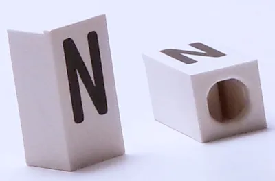 Tile, Modified 1 x 2 x 5/6 Stud Hole in End with Black Capital Letter N Pattern