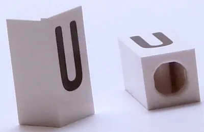 Tile, Modified 1 x 2 x 5/6 Stud Hole in End with Black Capital Letter U Pattern