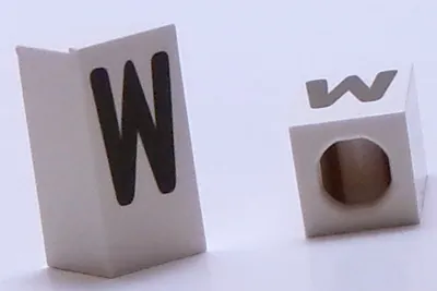 Tile, Modified 1 x 2 x 5/6 Stud Hole in End with Black Capital Letter W Pattern