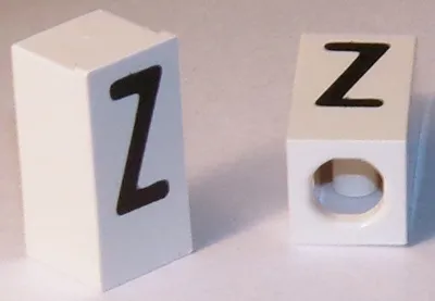 Tile, Modified 1 x 2 x 5/6 Stud Hole in End with Black Capital Letter Z Pattern