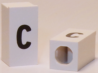 Tile, Modified 1 x 2 x 5/6 Stud Hole in End with Black Lowercase Letter c Pattern