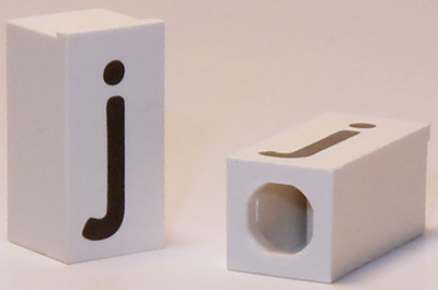 Tile, Modified 1 x 2 x 5/6 Stud Hole in End with Black Lowercase Letter j Pattern