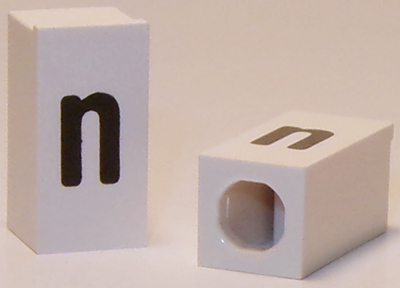 Tile, Modified 1 x 2 x 5/6 Stud Hole in End with Black Lowercase Letter n Pattern