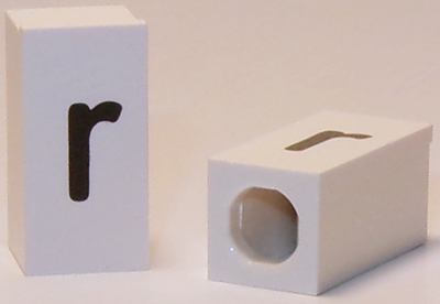 Tile, Modified 1 x 2 x 5/6 Stud Hole in End with Black Lowercase Letter r Pattern