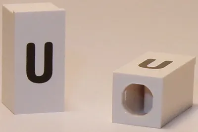 Tile, Modified 1 x 2 x 5/6 Stud Hole in End with Black Lowercase Letter u Pattern