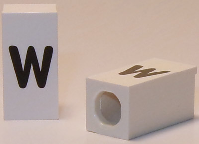 Tile, Modified 1 x 2 x 5/6 Stud Hole in End with Black Lowercase Letter w Pattern