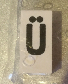 Tile, Modified 1 x 2 x 5/6 Stud Hole in End with Black Capital Letter U with Diaeresis (Ü) Pattern