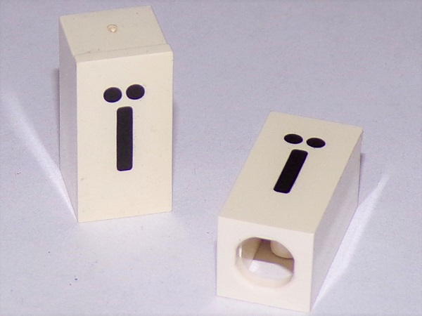 Tile, Modified 1 x 2 x 5/6 Stud Hole in End with Black Lowercase Letter i with Diaeresis (ï) Pattern