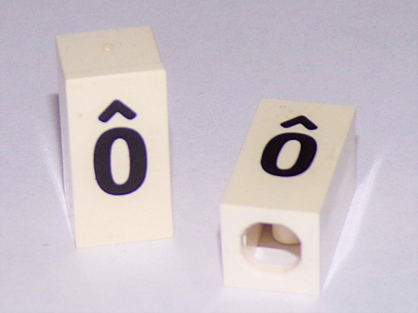 Tile, Modified 1 x 2 x 5/6 Stud Hole in End with Black Lowercase Letter o with Circumflex (ô) Pattern