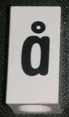 Tile, Modified 1 x 2 x 5/6 Stud Hole in End with Black Lowercase Letter a with Ring (Å) Pattern