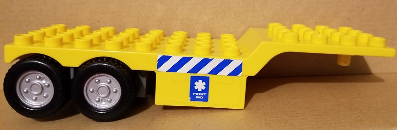 Duplo Trailer Four Rear Wheels, Elevated Front End, 4 x 12 with Blue and White Danger Stripes and 'FIRST AID' Pattern on Both Sides (Stickers) - Set 7844