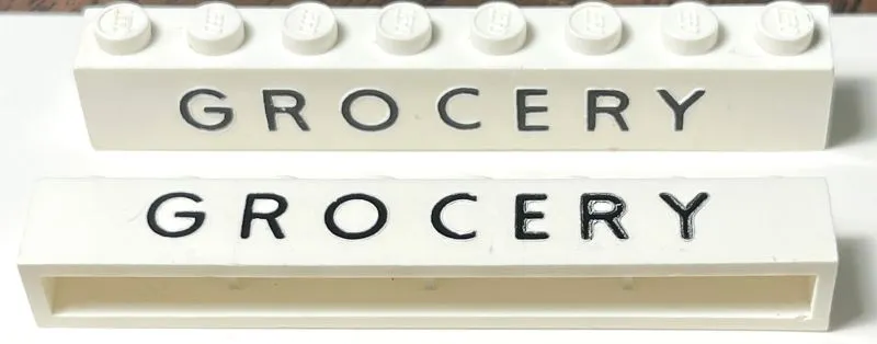 Brick 1 x 8 without Bottom Tubes with Cross Side Supports with Black 'GROCERY' Pattern