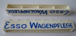 Brick 1 x 8 without Bottom Tubes with Cross Side Supports with Blue 'Esso Wagenpflege' Long, Thin Letters Pattern