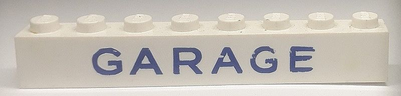 Brick 1 x 8 without Bottom Tubes with Cross Side Supports with Blue 'GARAGE' Sans-Serif Medium Pattern