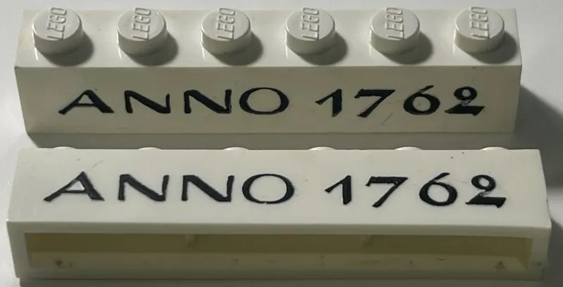 Brick 1 x 6 without Bottom Tubes with Cross Side Supports with Black 'ANNO 1762' Thin Pattern