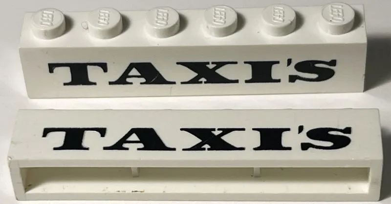 Brick 1 x 6 without Bottom Tubes with Cross Side Supports with Black 'TAXI'S' Serif Bold Medium Pattern