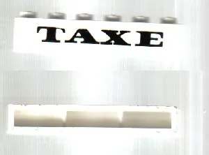 Brick 1 x 6 without Bottom Tubes with Cross Side Supports with Black 'TAXE' Pattern