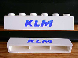 Brick 1 x 6 without Bottom Tubes with Cross Side Supports with Blue 'KLM' Pattern