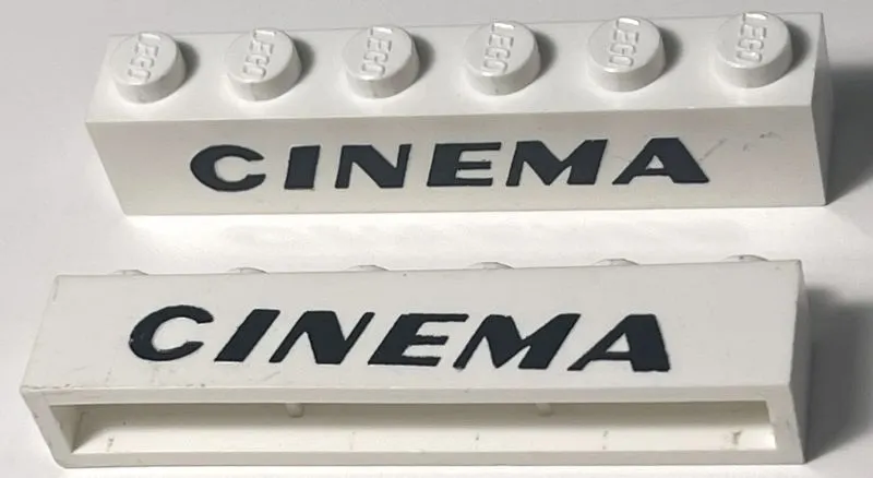 Brick 1 x 6 without Bottom Tubes with Cross Side Supports with Black 'CINEMA' Italic Bold Pattern