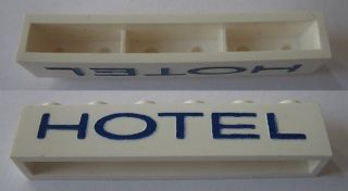 Brick 1 x 6 without Bottom Tubes with Cross Side Supports with Blue 'HOTEL' Thin (Letters Wide) Pattern