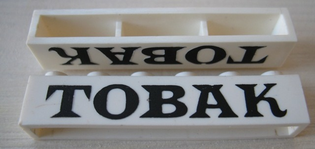Brick 1 x 6 without Bottom Tubes with Cross Side Supports with Black 'TOBAK' Serif Pattern