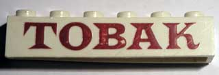 Brick 1 x 6 without Bottom Tubes with Cross Side Supports with Red 'TOBAK' Serif Pattern