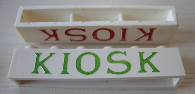 Brick 1 x 6 without Bottom Tubes with Cross Side Supports with Green 'KIOSK' Serif Pattern