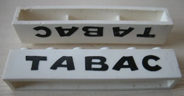 Brick 1 x 6 without Bottom Tubes with Cross Side Supports with Black 'TABAC' Pattern