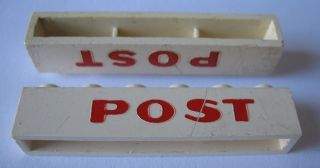 Brick 1 x 6 without Bottom Tubes with Cross Side Supports with Red 'POST' Pattern