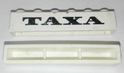 Brick 1 x 6 without Bottom Tubes with Cross Side Supports with Black 'TAXA' Serif Thick Pattern