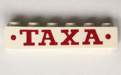 Brick 1 x 6 without Bottom Tubes with Cross Side Supports with Red 'TAXA' and Dots Bold Pattern